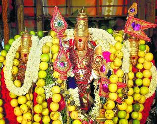 The deities of Lord Murugan with Goddess Valli and Deivanai adorning the temple car of Lord Subramaniaswamy Temple Tiruchendur